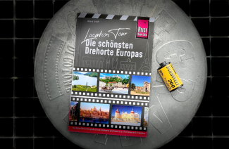 Buch Location Tour auf einer Filmrolle